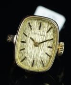 A converted watch ring, the head of the ring is a Longines watch, rectangular dial, with baton