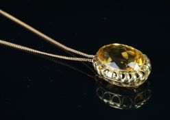 Citrine brooch pendant, mounted in yellow metal stamped 585, on unmarked yellow metal chain, gross