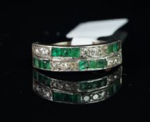 Art Deco emerald and diamond two row half eternity ring, set with old and brilliant cut diamonds and