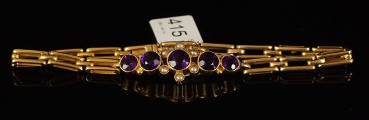 Amethyst and pearl bracelet, mounted in yellow metal stamped 18k, set with five round amethysts
