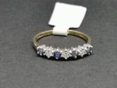 Seven stone blue stone and diamond half eternity ring, mounted in hallmarked 9ct yellow gold, claw
