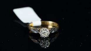 Single stone brilliant cut diamond ring, illusion set, mounted in yellow and white metal stamped