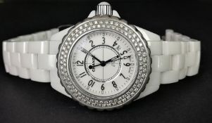 LADIES' CHANEL J12 WHITE CERAMIC WITH DIAMOND BEZEL, REF. Z.N. 40590, QUARTZ WRISTWATCH, circular