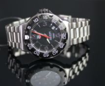 TAG HEUER FORMULA 1 REFERENCE WAC1110 - 0, black dial, silvered hour markers, rotating black outer