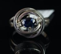 Sapphire and diamond three stone ring, mounted in white metal stamped 585, finger size N,