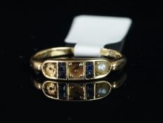 Sapphire and pearl ring, mounted in yellow metal stamped 585, finger size H 1/2, a/f, missing two