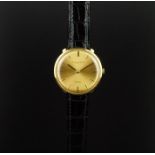 GENTLEMEN'S IWC DE LUXE 18K GOLD DRESS WATCH, circular champagne dial with gold hour markers and