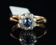 Antique sapphire and diamond cluster ring, mounted in hallmarked 18ct yellow gold and dated