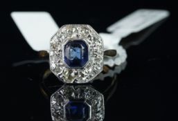 Blue paste and diamond cluster ring, mounted in yellow and white metal stamped 'PLAT' inside the