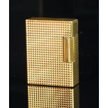 Dupont gold cased lighter, serial number 15 DBA55, weight approximately 94.2 grams. A/F, currently