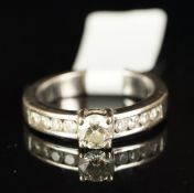 Diamond ring, central round brilliant cut diamond weighing an estimated 0.40ct, with diamond set