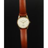 LADIES' ASPREY MANUAL WIND WRISTWATCH, 30mm circular gold case, off-white dial, second-hand sub-