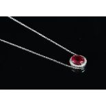 A synthetic ruby and diamond cluster pendant, central oval cut synthetic ruby, surrounded by round