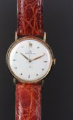 GENTLEMEN'S MOVADO VINTAGE 18K ROSE GOLD DRESS WATCH, circular off white dial with triangular