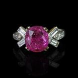 Burma pink sapphire and diamond ring, mounted in white metal with French import marks for 18ct and