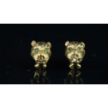 Leopard head earrings, mounted in yellow metal stamped 14K, with post and clip fittings, with