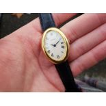 MID SIZE CARTIER BAIGNOIRE MANUAL WOUND IN 18K YELLOW GOLD MANUALLY WOUND WRISTWATCH, oval white