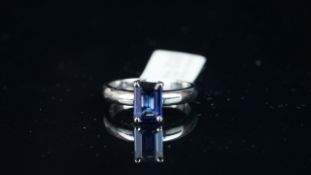 Single stone blue sapphire ring, single emerald cut sapphire four claw set, mounted in hallmarked