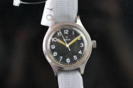 GENTLEMEN'S OMEGA MILITARY 6B VINTAGE WRISTWATCH CIRCA 1956, circular black dial with white Arabic