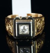 A gentlemen's single stone diamond ring, central old cut diamond, mounted in white metal on a yellow