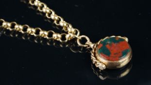 Carnelian and bloodstone swivel fob, mounted in hallmarked 9ct yellow gold, on a yellow metal