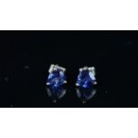 Pair of blue sapphire stud earrings, mounted in hallmarked 18ct white gold, post and butterfly