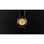 LADIES' AUDEMARS PIGUET WRISTWATCH, circular gold dial with gold hour markers and hands, black