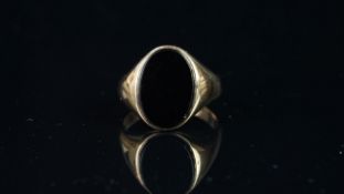 Onyx signet ring, oval cut Onyx 14x10mm, yellow gold band tested as 9ct, ring size UK M / US 6