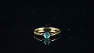 Single blue stone ring, mounted in hallmarked 9ct yellow gold, finger size M, approximate weight 1.0