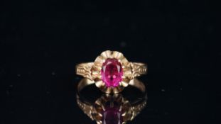 Single pink/red stone ring, mounted in hallmarked 14ct yellow gold, finger size P, approximate