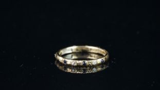 Blue & white stone half eternity ring, mounted in hallmarked 9ct yellow gold, finger size P 1/2,