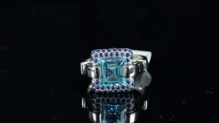 NEW OLD STOCK, UNWORN RETIRED STOCK - Blue topaz and sapphire ring, central square step cut blue
