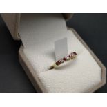 Ruby and diamond half eternity ring, alternating round cut rubies and round brilliant cut