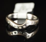 Shaped diamond set wedding band, mounted in hallmarked 18ct white gold, set with seven brilliant cut