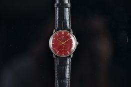 VINTAGE GIRARD-PERREGAUX, red circular dial, baton hour markers, subsidiary seconds dial, 34mm steel