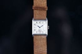 VINTAGE SILVER CASED WRISTWATCH, square white dial, Arabic numerals, subsidiary seconds dial, 27mm