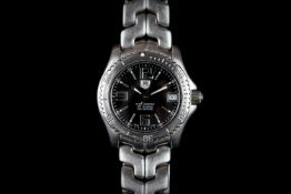 GENTLEMEN'S TAG HEUER CHRONOMETER REFERENCE WT5210, circular black dial, baton and Arabic