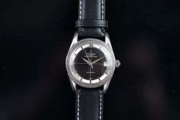 VINTAGE UNIVERSAL GENEVE POLEROUTER DATE AUTOMATIC, circular black quarter dial, date aperture,