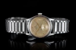 VINTAGE ROLEX OYSTER ROYAL REFERENCE 4444 CIRCA 1947, circular champagne dial with patina, gold