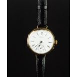 RARE GENTLEMEN'S LONGINES 9K GOLD TRENCH WATCH CIRCA 1930's, circular white dial with black roman