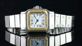 CARTIER BI COLOUR SANTOS WRISTWATCH, square white dial with Roman numerals, gold bezel, steel and