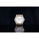 MID SIZE EBEL 18CT GOLD DATE WRISTWATCH, circular cream dial with gold roman numerals and a date