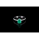 Emerald and diamond ring, 1 pear shape emerald estimated 1.11ct, 14ct white gold shoulders set