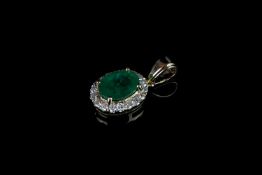 Emerald and diamond pendant, 1 oval cut emerald estimated 1.25 ct, 18 round brilliant cut diamonds