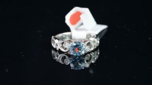 NEW OLD STOCK, Aquamarine and Diamond ring, central aquamarine, diamond detail scroll shoulders,