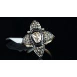 Large fancy shaped diamond cluster ring, mounted in silver on gold, central fancy shaped diamond