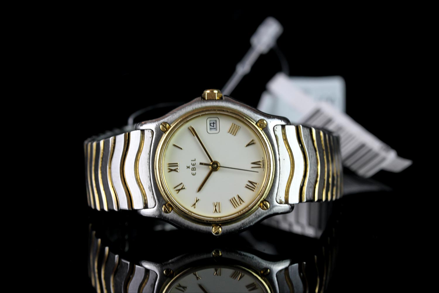 LADIES EBEL WAVE WRISTWATCH REF 183908, circular cream dial with gold roman numerals and hands, date