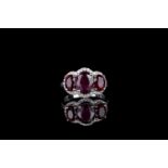 Ruby and diamond ring, 3 oval rubies each set in 4 claws, centre ruby estimated 1.67ct, 2 outer