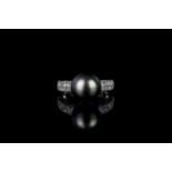 Pearl and diamond ring, 1 round silver oval estimated 10.55mm, 56 round brilliant cut pave set