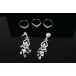 18K WHITE GOLD EARRINGS AND STACKING RING SET OF JEWELLERY, pair of drop earrings stamped 18k, three